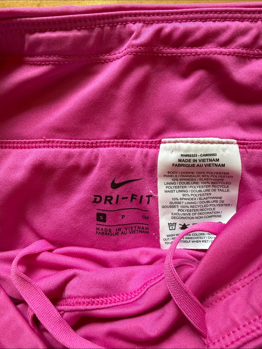 Nike Women's Bright Magenta Athletic Shorts with Silver Swoosh - Picture 2 of 4